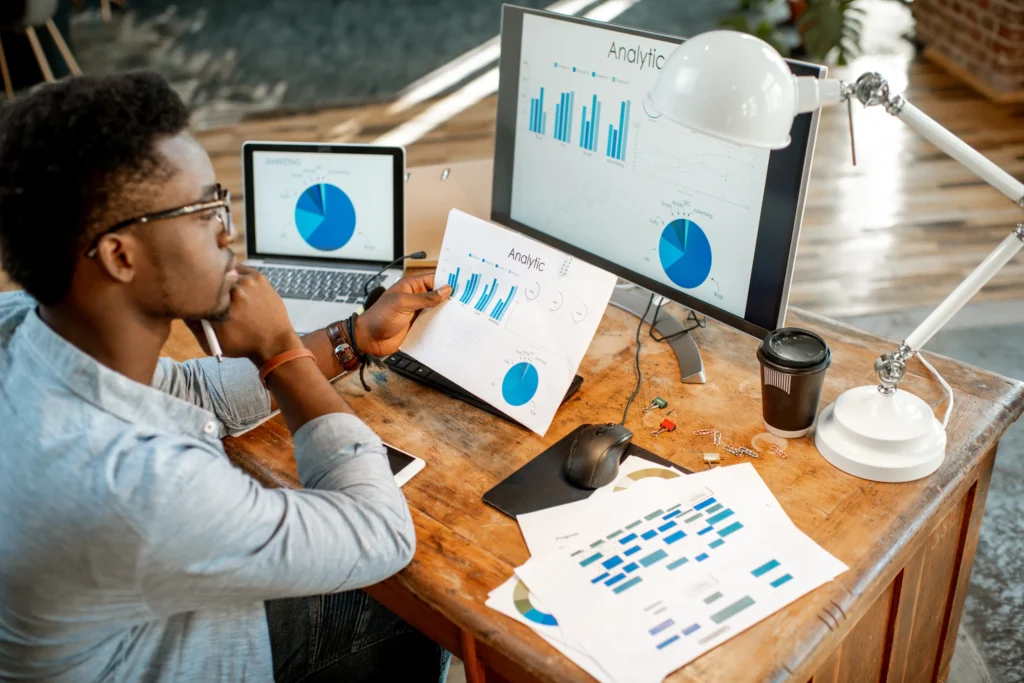 man reviewing competitive analysis data