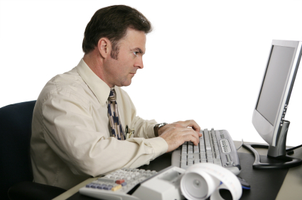 An accountant using an online program to do income taxes.