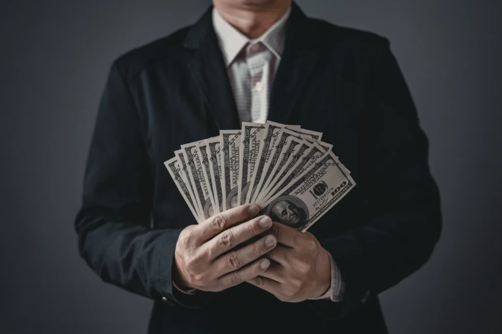 crowdfunding man holding money