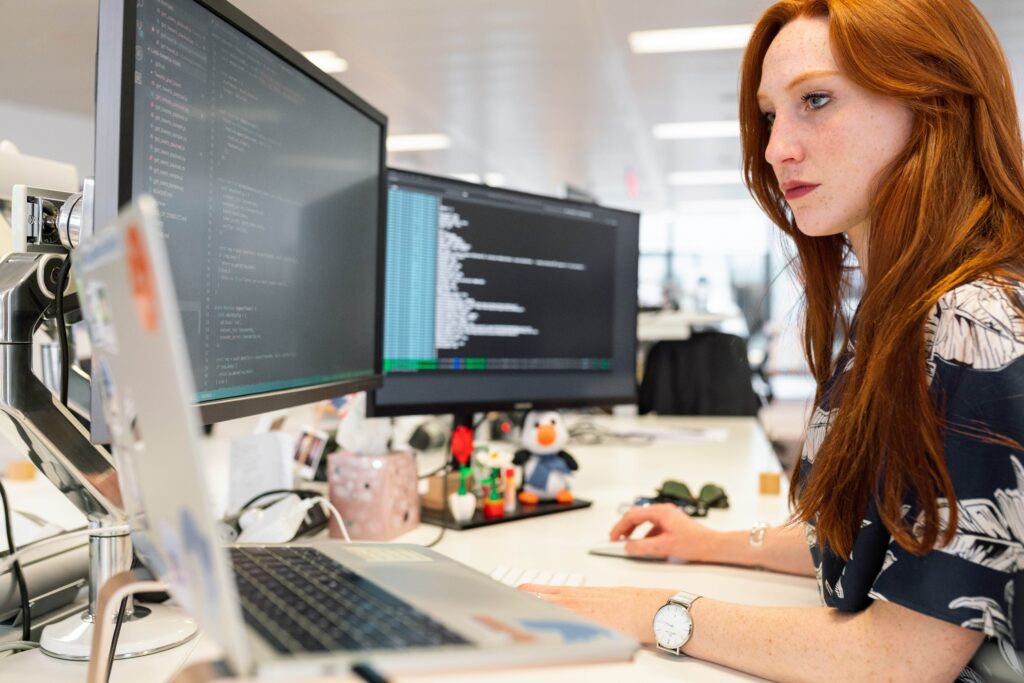 woman programmer working in security
