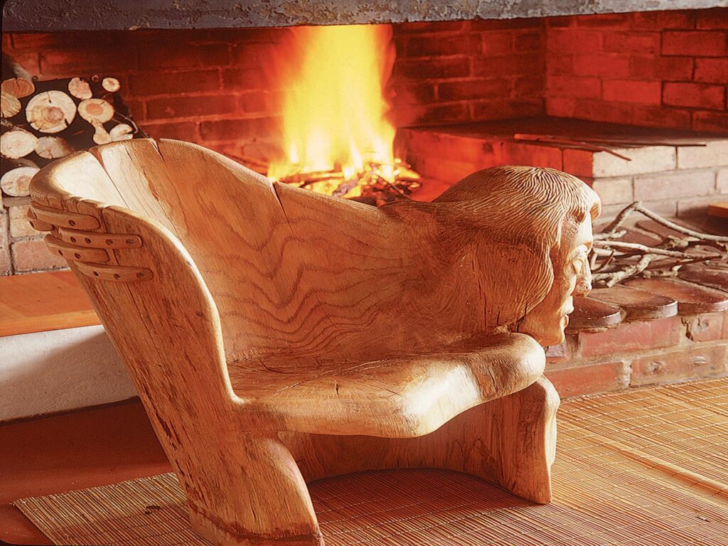 wooden chair created by Andrew Atwood, founders of Antbear Eco Lodge eco-tourism