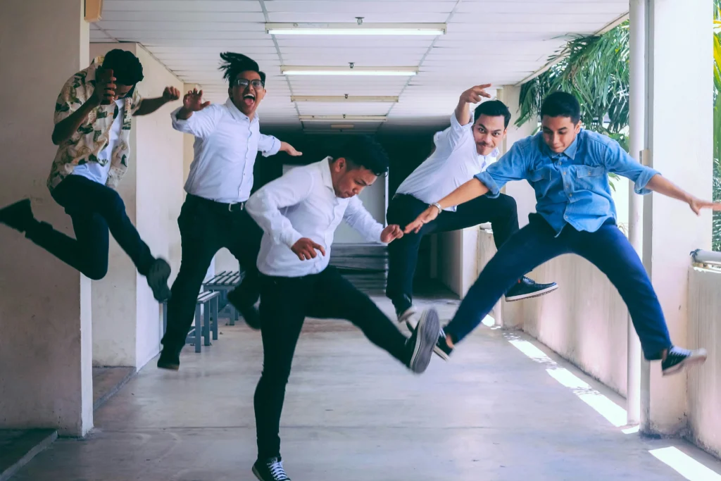 employees jumping in new office