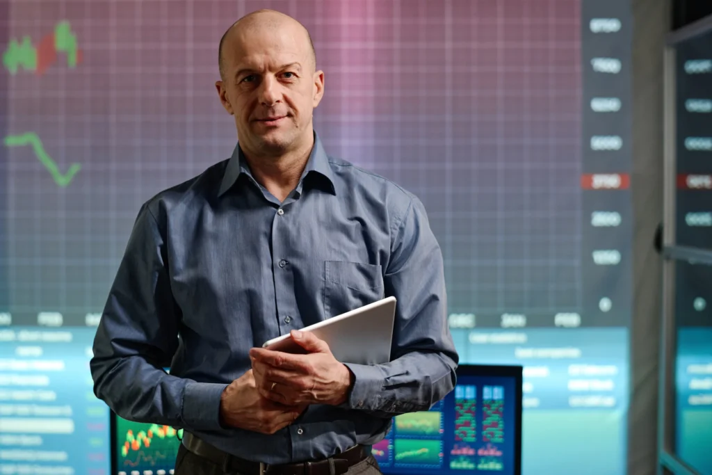 freight broker man with charts