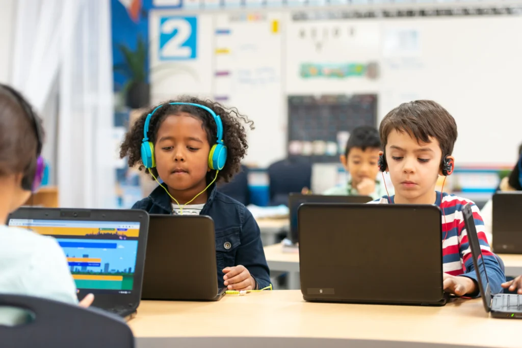 Special Education Service Providers: classroom kids in front of computer
