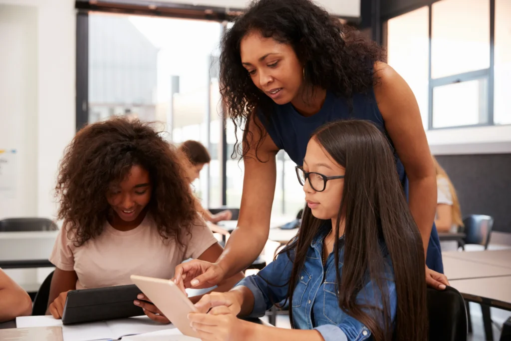 Special Education Service Providers: teacher and kids with tablet