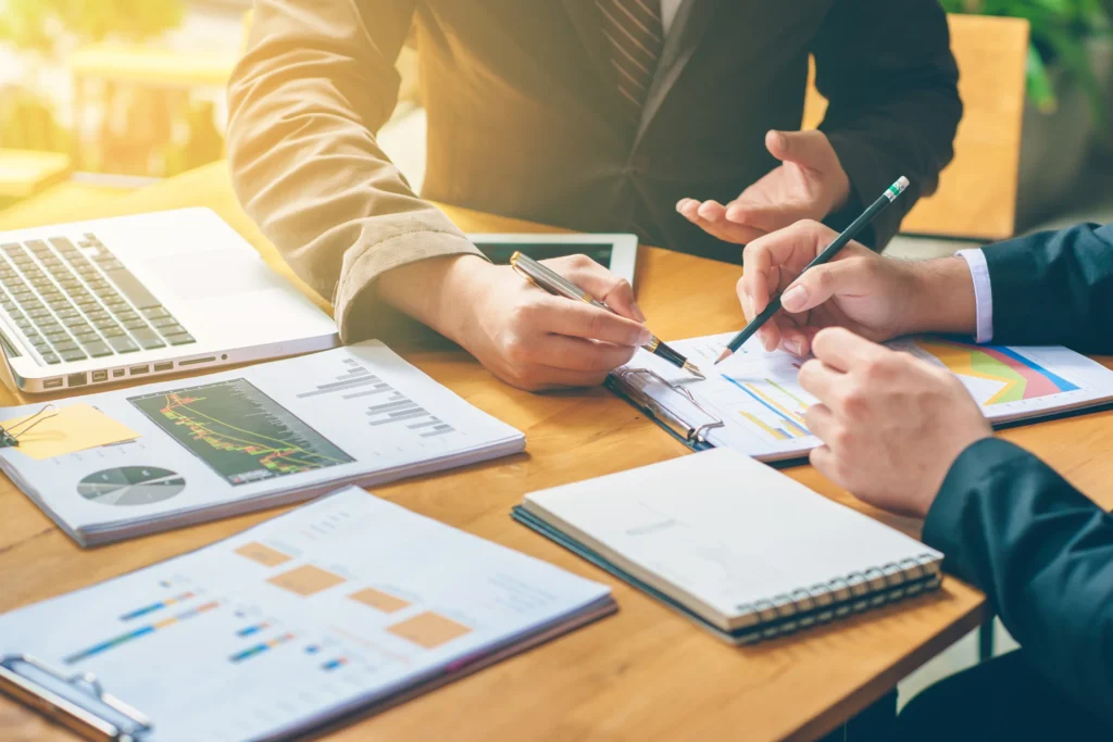 business plan: entrepreneurs looking at charts