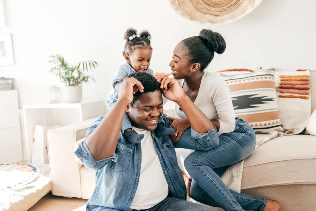 life insurance policy: young black family
