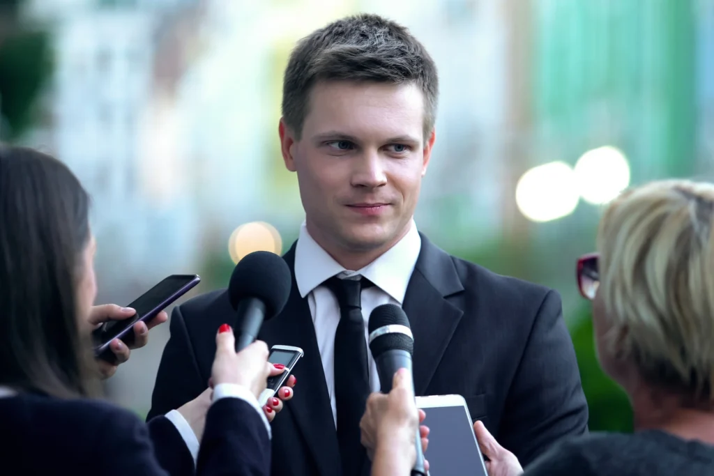 public relations: man being interviewed