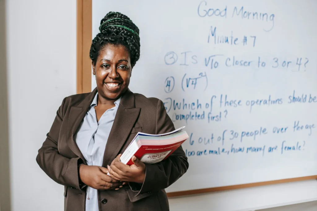 teacher standing by the board