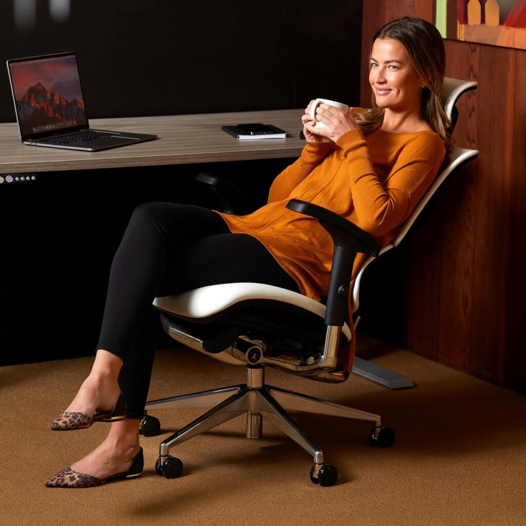 woman enjoying her air conditioning system in her home office