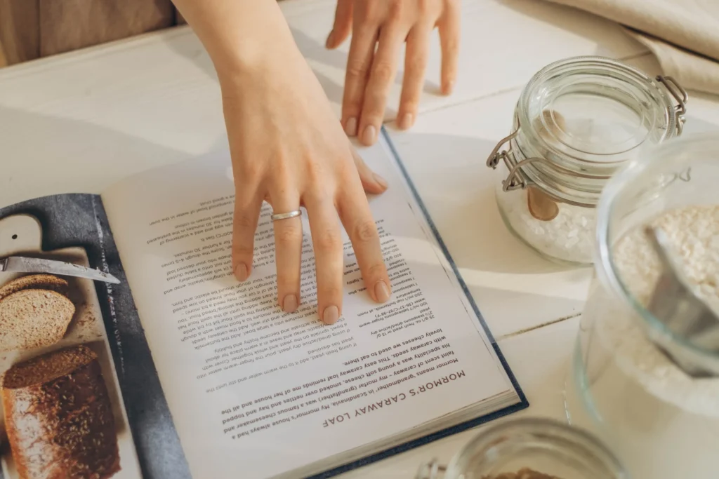 chef reading recipe cookbook