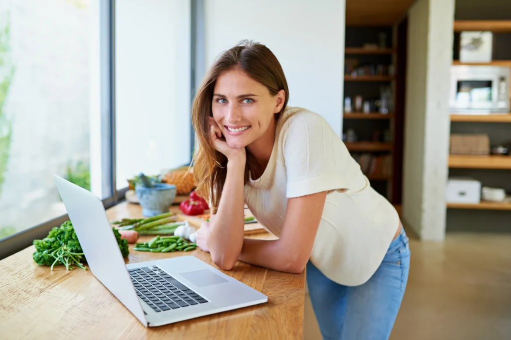 woman reading recipes to cook food