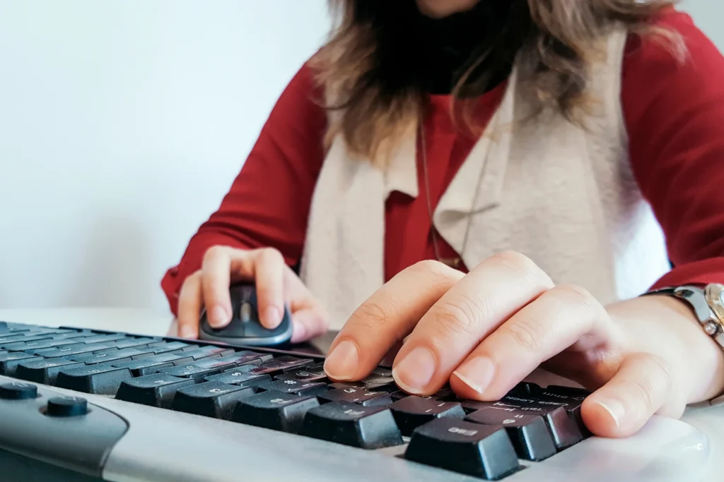 data entry : woman typing in computer