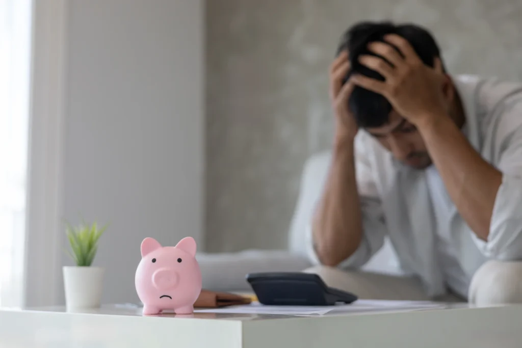 man stressed due to debt