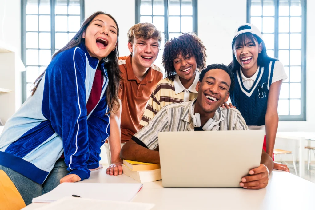 generation z teenagers on laptop online